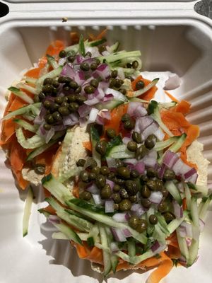 Vegan bagel and lox came loaded!   at Simple Cafe in Asheville
