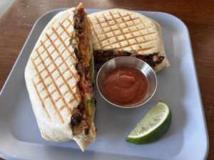 Vegan crunch wrap with hot sauce   at Simple Cafe in Asheville