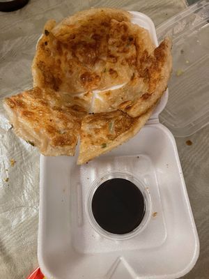 Scallion pancake with vinegar sauce to-go 350 at Han Noodle Bar in Rochester