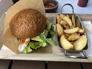 Beyond Meat burger with potato wedges  at Vegan Burger in Dornbirn