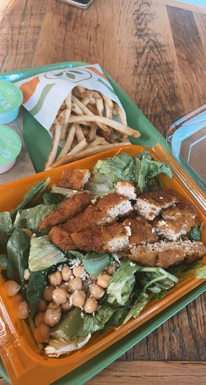 caesar salad and fries  at Plant Power Fast Food in Long Beach