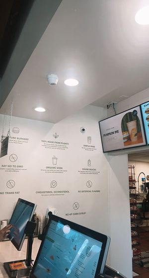 counter w screens to order from   at Plant Power Fast Food in Long Beach