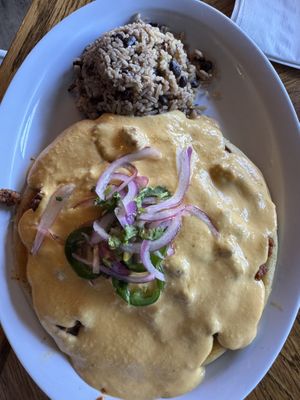 The avalanche with vegan queso and soyrizo on a potato and mushroom pupusa   at Monse's Pupuseria in Colorado Springs