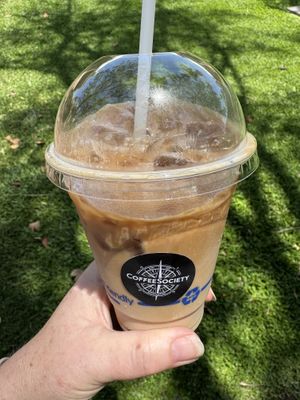 Oat milk iced coffee  at Coffee Society in Rockhampton