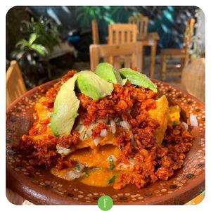 Chilaquiles with vegan chorizo -made of oats- at Aguacate Limon in Tulum