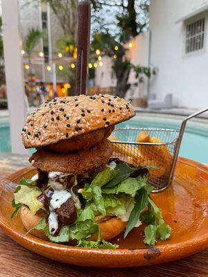 Burger at Aguacate Limón new location -outdoors- at Aguacate Limon in Tulum