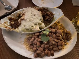 Ordered the enchiladas with the lentil walnut filling and both sauces (half and half).  Perfect for a cold day! Very tasty and flavorful!   at The Burrow in Vancouver