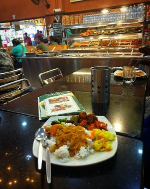 take some rice and put everything on it :) at Vinny Jeyaa Banana Leaf Curry House in Kuala Lumpur