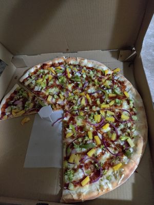 Large pizza w/ BBQ sauce base, onion, pineapple, broccoli, and roasted garlic at Pizza Jerks in Lake George