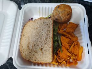 The Green sandwich with sweet potato chips & added a Vegan pb & choc chip muffin for dessert at The Green Witch in Highland