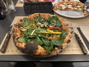 Vegetable pizza with vegan cheese  at Peruzza in Ljubljana