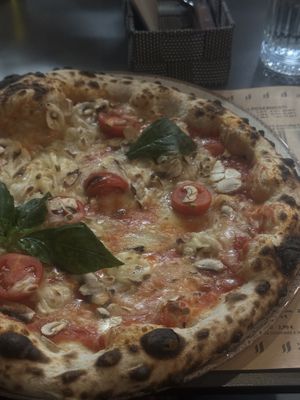 Margerita with vegan cheese and mushrooms  at Peruzza in Ljubljana