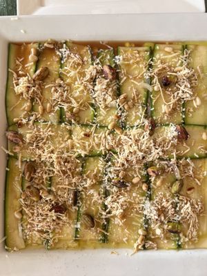 Zucchini carpaccio with toasted pistachios and pine nuts with a bright vinegar  at Dalmatino in Hvar