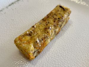 Complimentary starter for everyone (Inc meat eaters). Polenta, tofu and rosemary slice.  at Dalmatino in Hvar