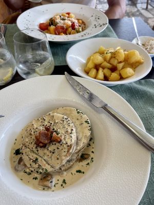 Full meal. Gnocchi, fried potatoes and peppercorn sauce covered seitan steak.  at Dalmatino in Hvar