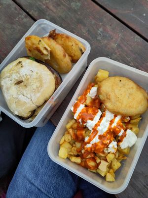 Patatas bravas with deep fried aubergine, then more aubergine in the other boxes with two sandwiches - delicious! at Pinchito LTD in Cambridge