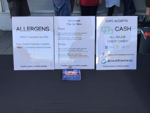 Event signage with Allergens, menu & payment options  at California Vegan Food Company in San Jose