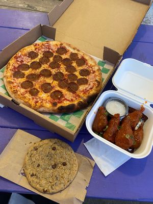 Pepperoni pizza, chocolate chip cookie & buffalo wings with ranch! All vegan 😍  at Possum Pizza in Austin