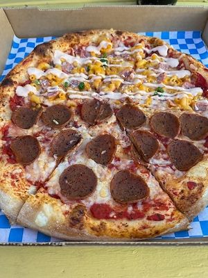 Possumroni and buffalo mac at Possum Pizza in Austin