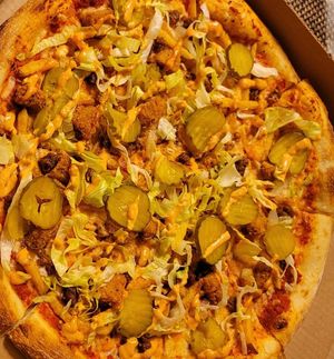 Dollar menu pizza at Possum Pizza in Austin