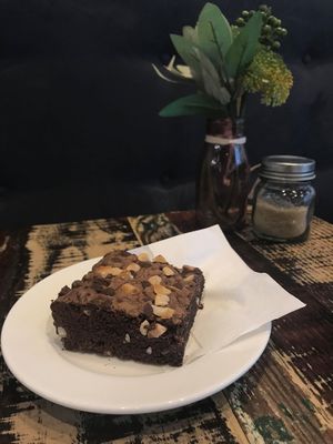 Vegan chocolate and macadamia brownie at Desta in Preston