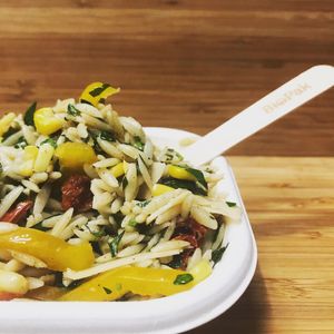 Risoni, sundried tomato, corn, capsicum, parsley and vegan mozzarella pasta salad at Desta in Preston