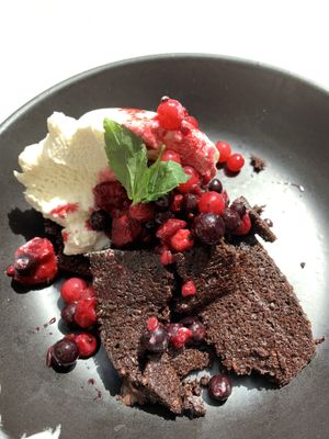 Vegan brownie, ice cream & berries   at Nourish in Letchworth
