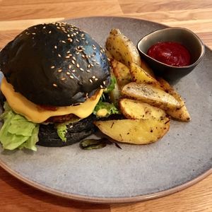 The ‘Burghain’ with a black bean patty, potato wings and amazing smoky BBQ sauce! at VEG'D - Vegan Burgers - F-Hain in Berlin