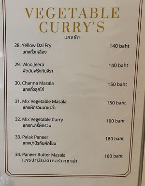 Vegetable curries. 28, 29, 30 and 31 are natively vegan, 33 can be made vegan by replacing the paneer with potato.  at Primani's in Udon Thani