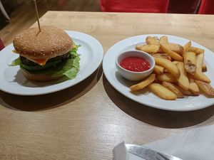 Avocado burger and fries at Veganland in Prague