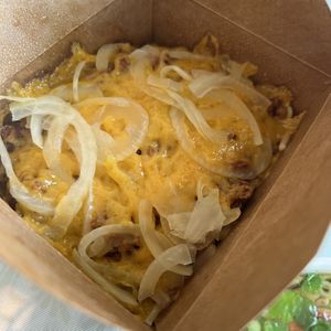 Cincinnati Chili—under the cheese and onions is a mountain of pasta and Cincy chili. Absolutely hit the spot!   at Loving Hut in Cincinnati