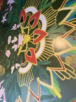 Pretty mural on wall at Coriander  at Coriander in Denver