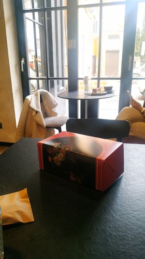 Delivery bow with cake inside at Karma Kava in Ternopil