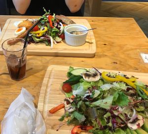 The vegan version of the salad vs. my friend’s salad  at Shiromachi Grill in Nagoya