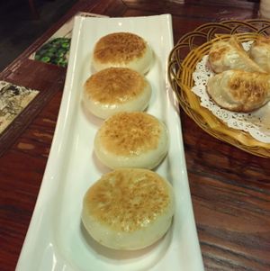 pancakes on the left, fried dumplings on the right at Yunlaiju - Windlucky - Futain District in Shenzhen