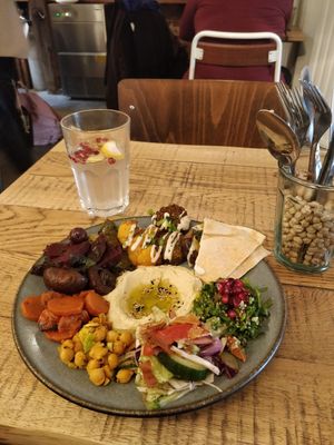 Ginger pomegranate lemonade and vegan combo/mix plate. Delicious :) at Pois Chiche in Brussels