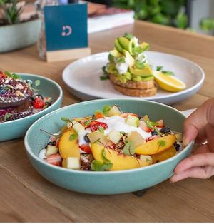 Housemade Granola, with seasonal fruit and coyo at Appy Eatery in Carlton