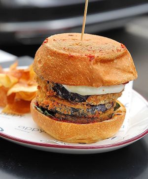 Eggplant Parma. Ordinarily served with dairy cheese, customisable to vegan cheese.  at Appy Eatery in Carlton