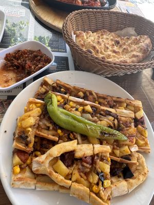 Vegan Pidé, Turkish bread and spicy tomato salsa.   at Zümrüt Pide Salonu in Kusadasi