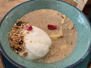 Apple pie porridge with almond milk and granola  at Lina's Coffee in Dusseldorf