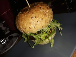 The burger was nothing special,  the burger bun was too dry. They have 2 vegan options: burger and falafel burito + fries.  at King's Caffe in Rijeka