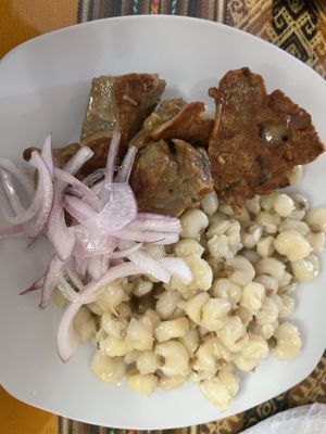 Chicharron con mote   at Restaurant Vegetariano Mais in Trujillo