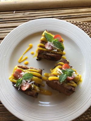 Vegan French toast with mango  at Le Bamboo Bali in Pecatu