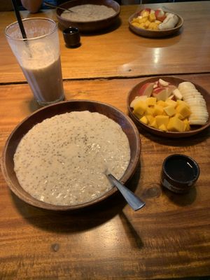 Chia and oat porridge with extra fruit and coconut ice coffee  at Saigonese Eatery in Phu Quoc