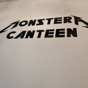 Signage at Monstera Canteen in Luton