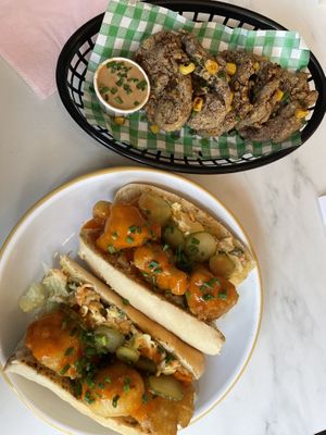 Japanese karage chick’n bites with satay sauce. Cauliflower baguette with gherkins and slaw.   at Monstera Canteen in Luton