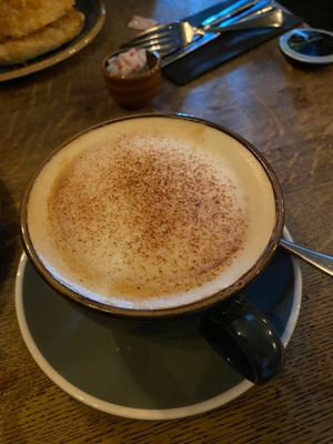 Cappuccino made with oat milk at Plau Gin & Beer House in Preston