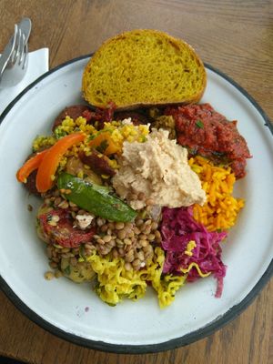 Lunch buffet plate with falafel, selection of salads and dips at Sandro in Helsinki