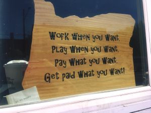 sign in the window  at Portobello Vegan Trattoria in Portland