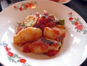 Potato Gnocchi with Spicy Ragu: Pan-crisped potato dumplings with a ragu of summer squashes, hot peppers, and tomato-basil sauce at Portobello Vegan Trattoria in Portland